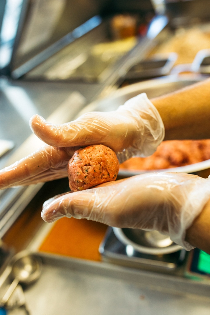 meatball being prepared at capriotti's sandwich franchise 
